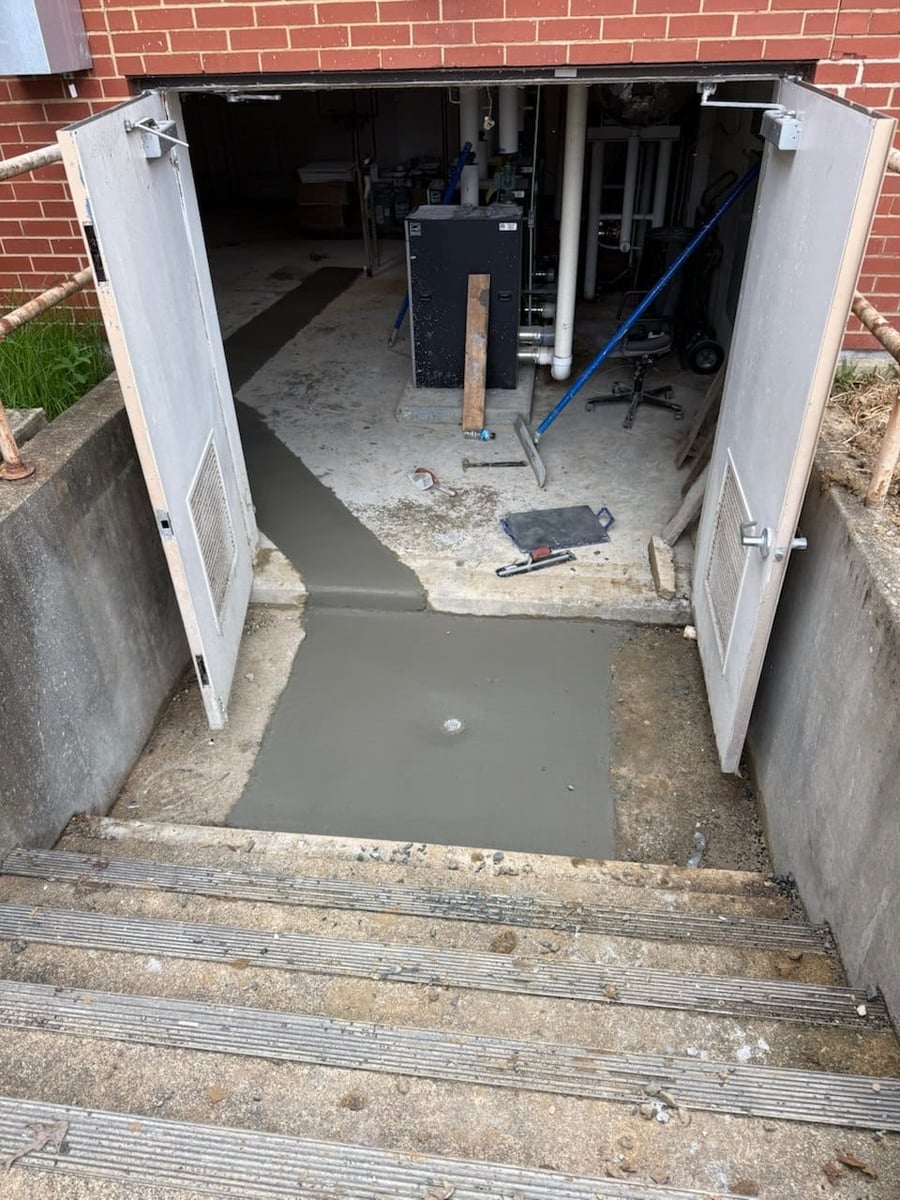 Concrete floor repair through basement bulkhead — Hampton Roads, VA